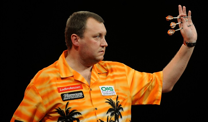 Wayne Mardle waves goodbye to the Alexandra Palace fans after his third round defeat to Co Stompe
