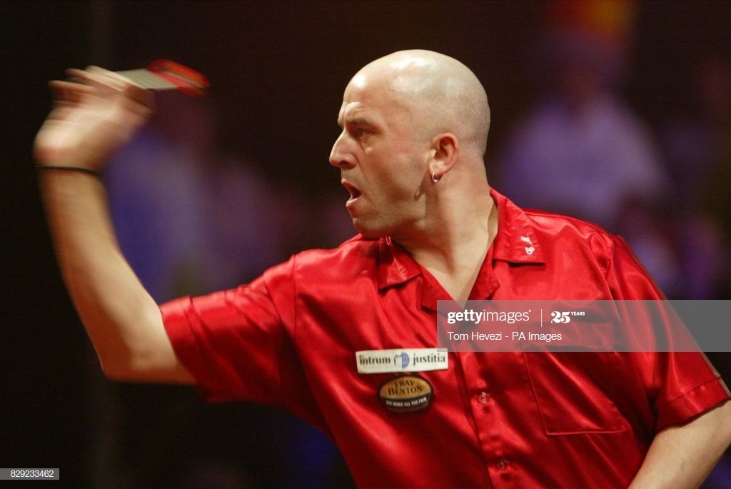 England's Colin Monk during his match against England's Mervyn King in todays Quarter finals in the 2003 Embassy World Darts Championships in Frimley Green, Surrey. (Photo by Tom Hevezi - PA Images/PA Images via Getty Images)