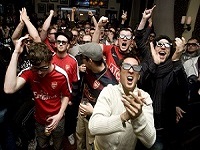 CARDIFF, WALES - JANUARY 31:  Football fans in Cardiff watch the worlds first live 3D TV football match between Arsenal and Manchester United broadcast by Sky ahead of its full 3D channel launch in April.  (Photo by Alan Crowhurst/ Getty Images)